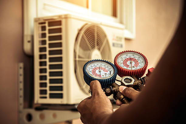 Professional Heat Pump Repair technician working in Colfax, LA